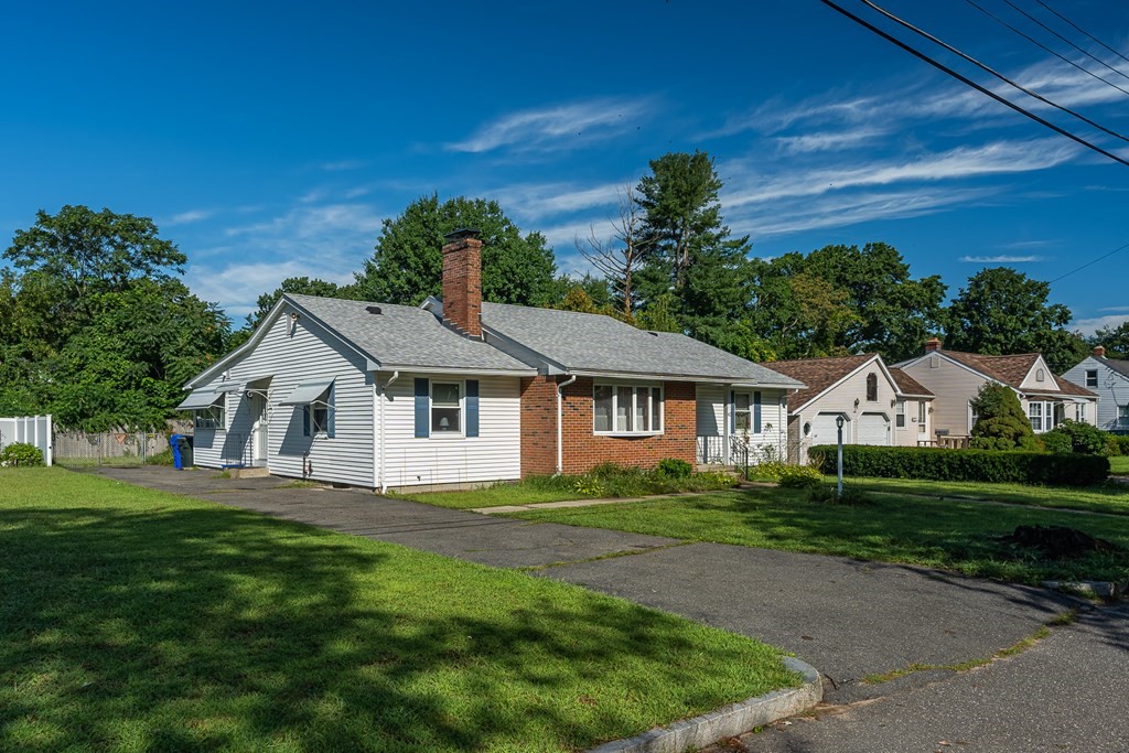 42 Kulig Street Springfield, MA 01104 - Photo 2 of 33 a front view of a house with a yard