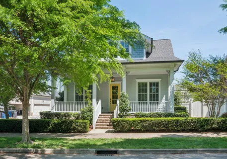front view of a house with a small yard