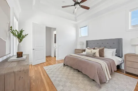 a bedroom with bed and window