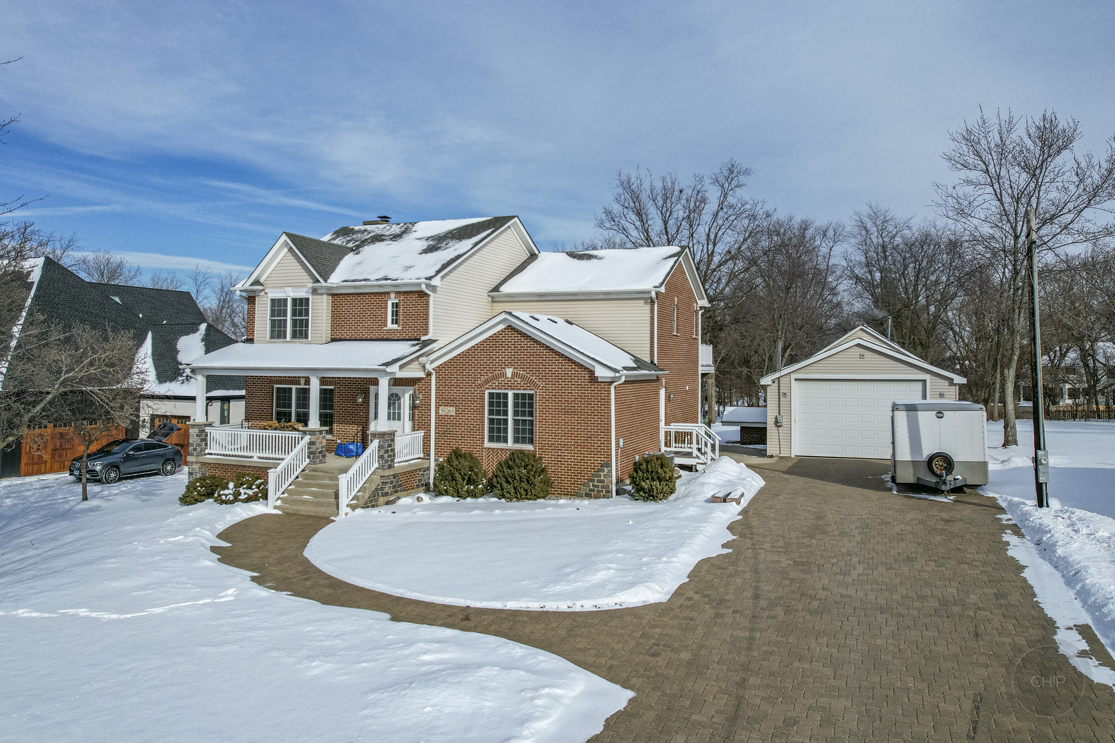 5S263 Middle Road Naperville, IL 60563 - Photo 1 of 46 a front view of a house with a garden