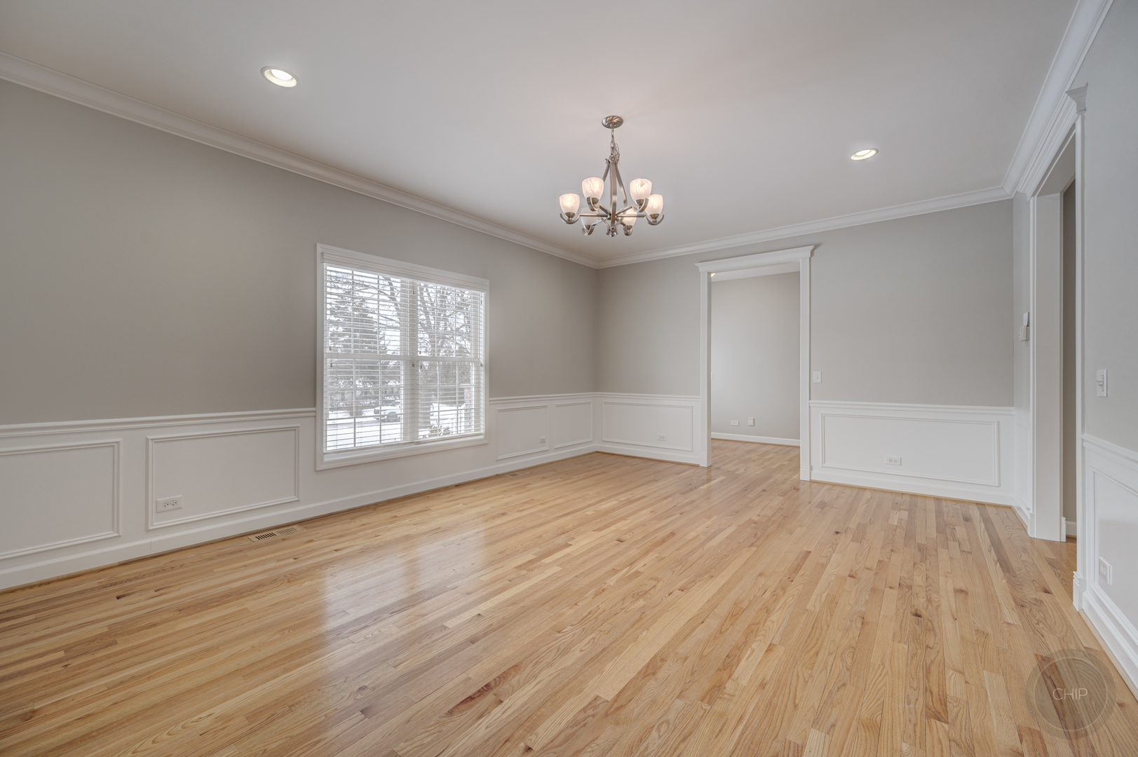 5S263 Middle Road Naperville, IL 60563 - Photo 15 of 46 a view of an empty room with wooden floor and a window
