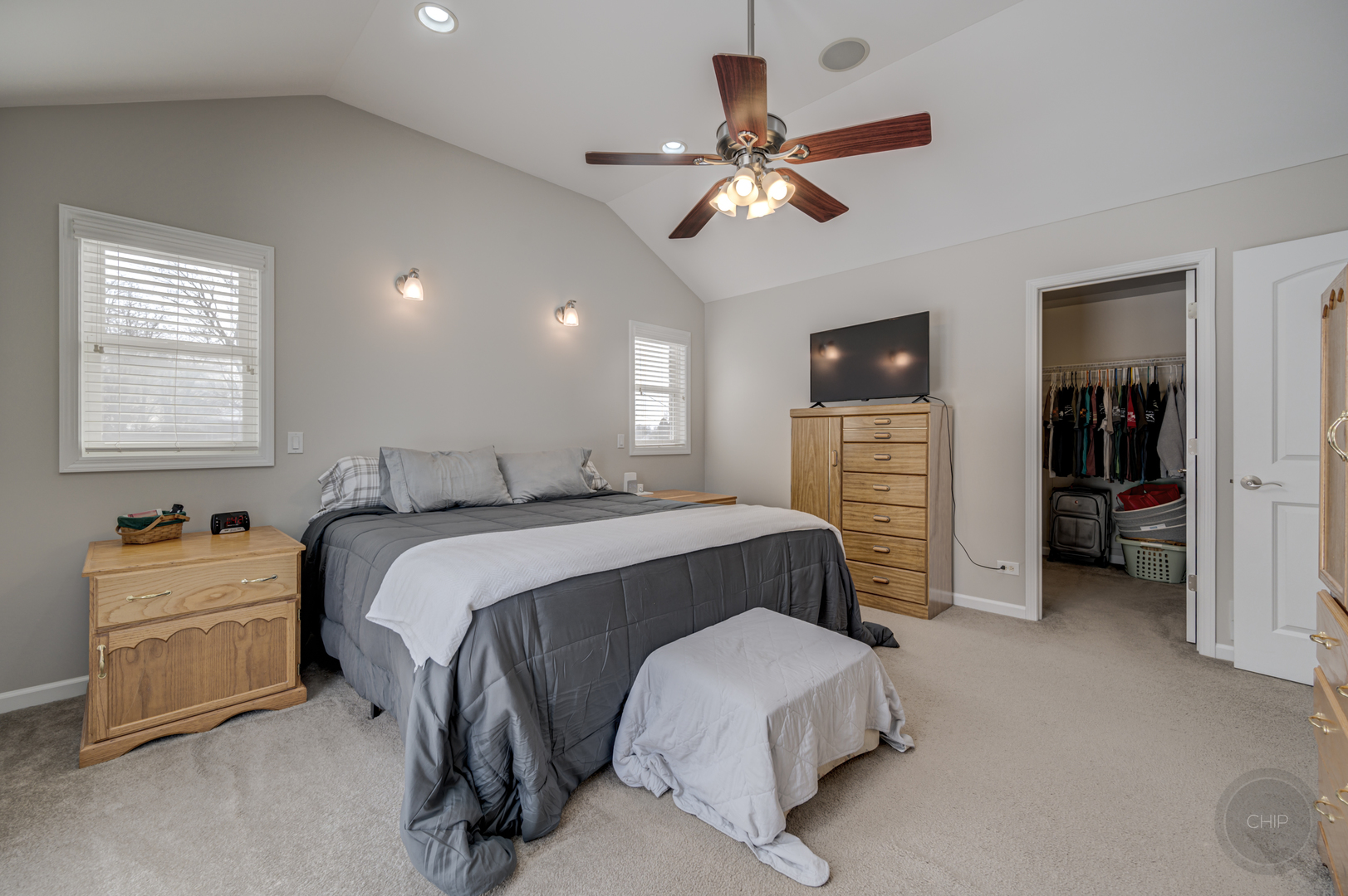 5S263 Middle Road Naperville, IL 60563 - Photo 19 of 46 a bedroom with a bed and ceiling fan