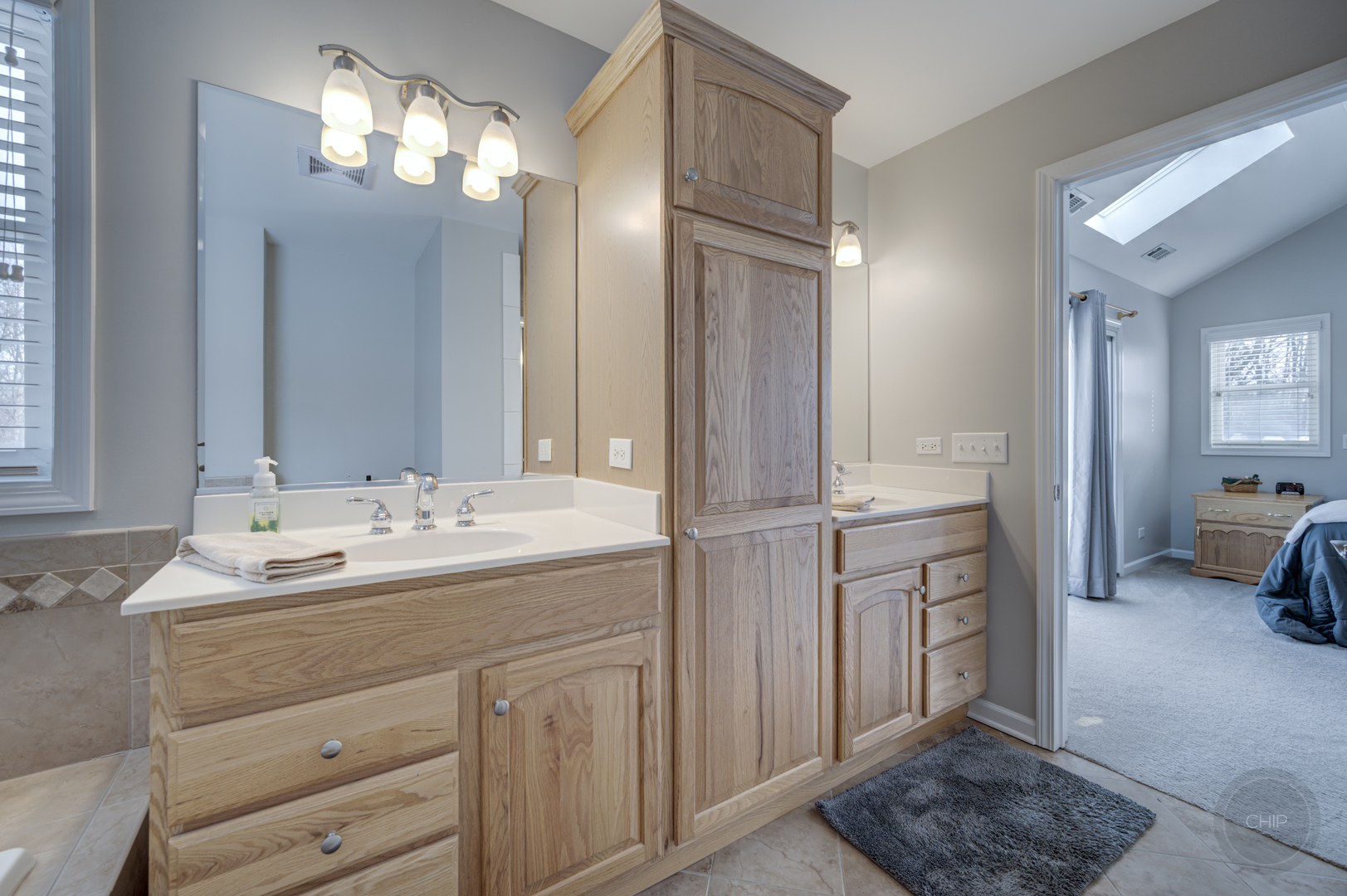 5S263 Middle Road Naperville, IL 60563 - Photo 23 of 46 a bathroom with a sink double vanity and a mirror