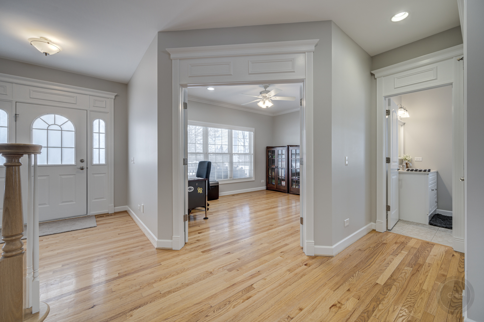 5S263 Middle Road Naperville, IL 60563 - Photo 6 of 46 a view of a room with wooden floor and a bathroom