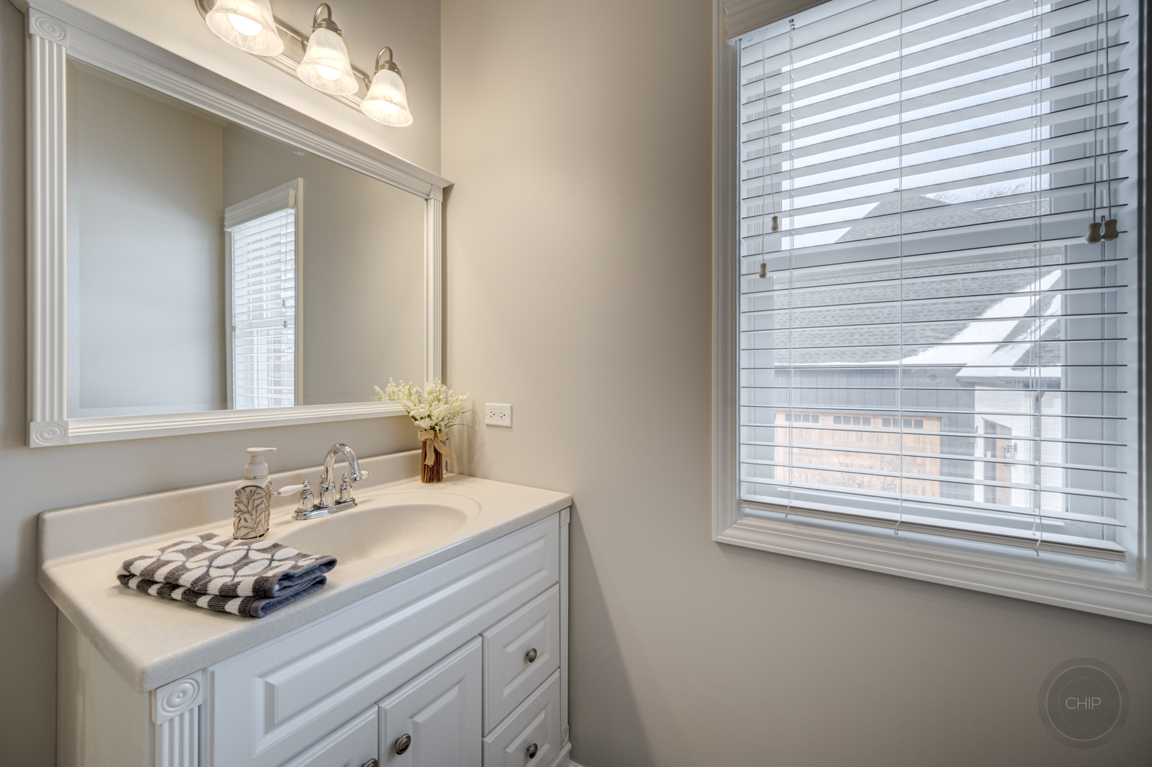5S263 Middle Road Naperville, IL 60563 - Photo 7 of 46 a bathroom with a sink vanity and a mirror