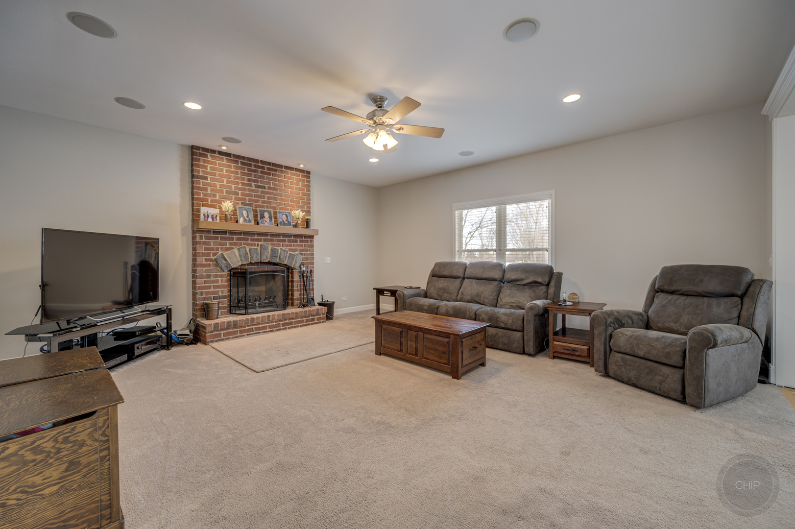 5S263 Middle Road Naperville, IL 60563 - Photo 9 of 46 a living room with furniture and a flat screen tv