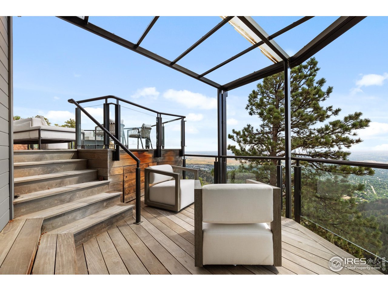 1145 Timber Lane Boulder, CO 80304 - Photo 10 of 40 a view of a balcony with chairs