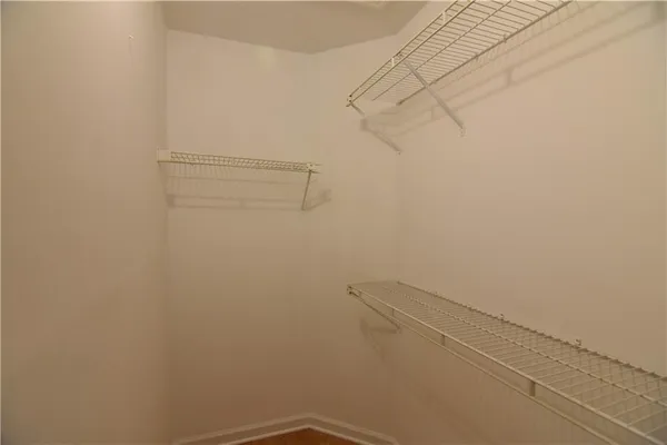 a view of a room with racks on the wall
