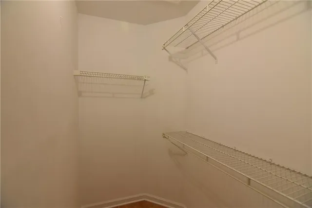 a view of a room with racks on the wall