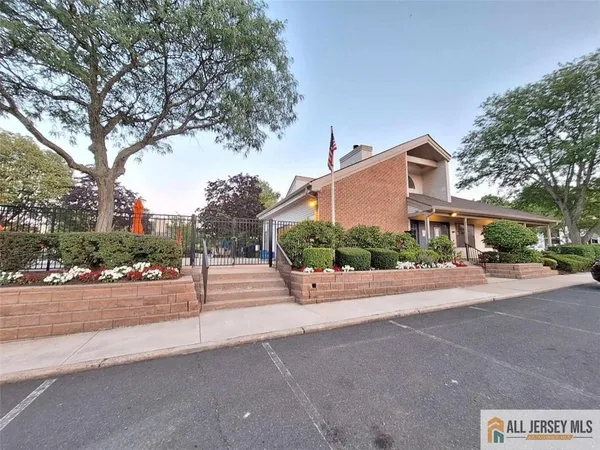 a view of a car parked on the side of a street