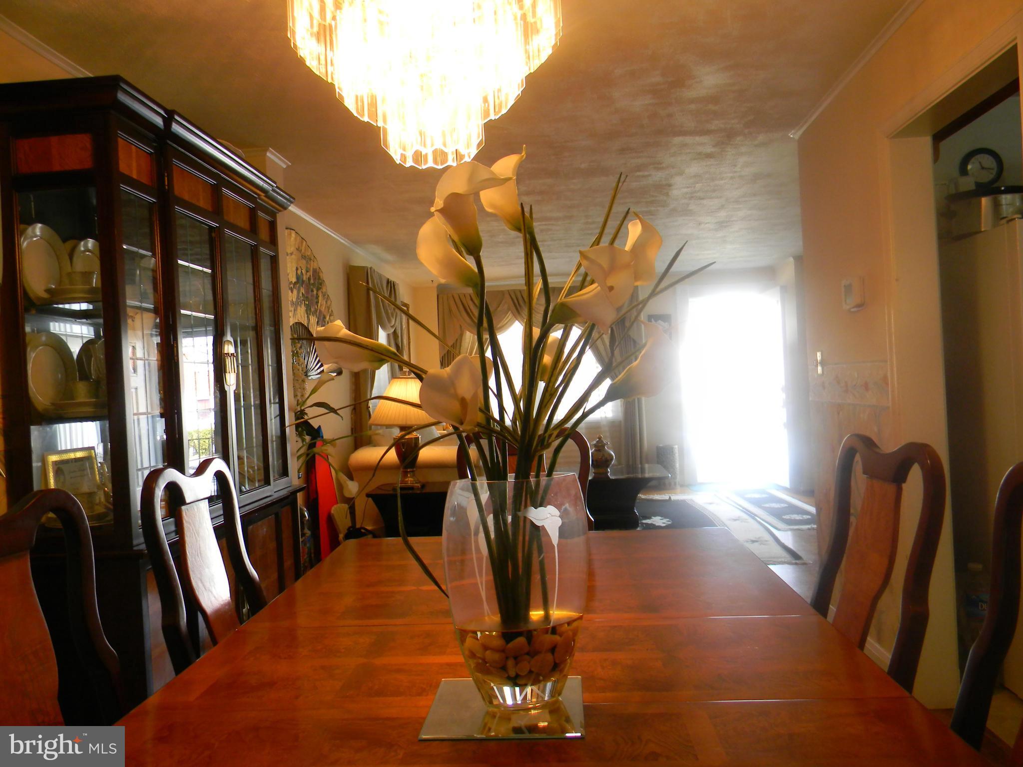 1515 Clairidge Road Baltimore, MD 21207 - Photo 8 of 21 a vase of flowers sitting on a table