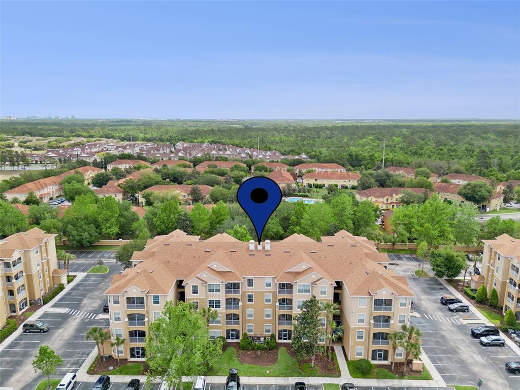 2809 Almaton Loop, Unit 401 Kissimmee, FL 34747 - Photo 29 of 59 an aerial view of multiple house