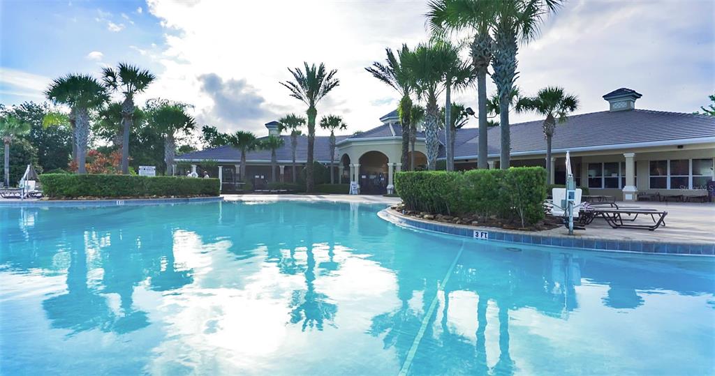 2809 Almaton Loop, Unit 401 Kissimmee, FL 34747 - Photo 46 of 59 a view of a lake with a house