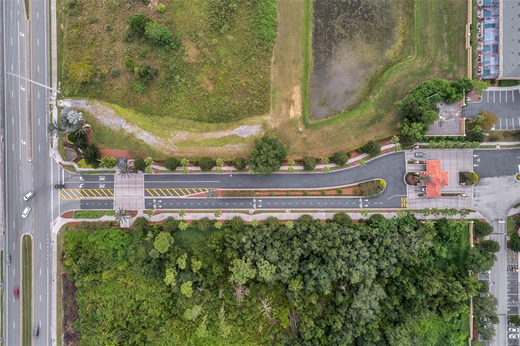 2809 Almaton Loop, Unit 401 Kissimmee, FL 34747 - Photo 51 of 59 a front view of a house with a yard