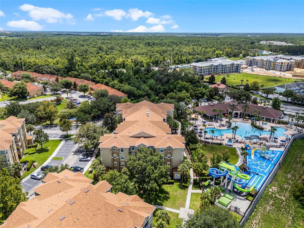 2809 Almaton Loop, Unit 401 Kissimmee, FL 34747 - Photo 54 of 59 an aerial view of residential houses with outdoor space