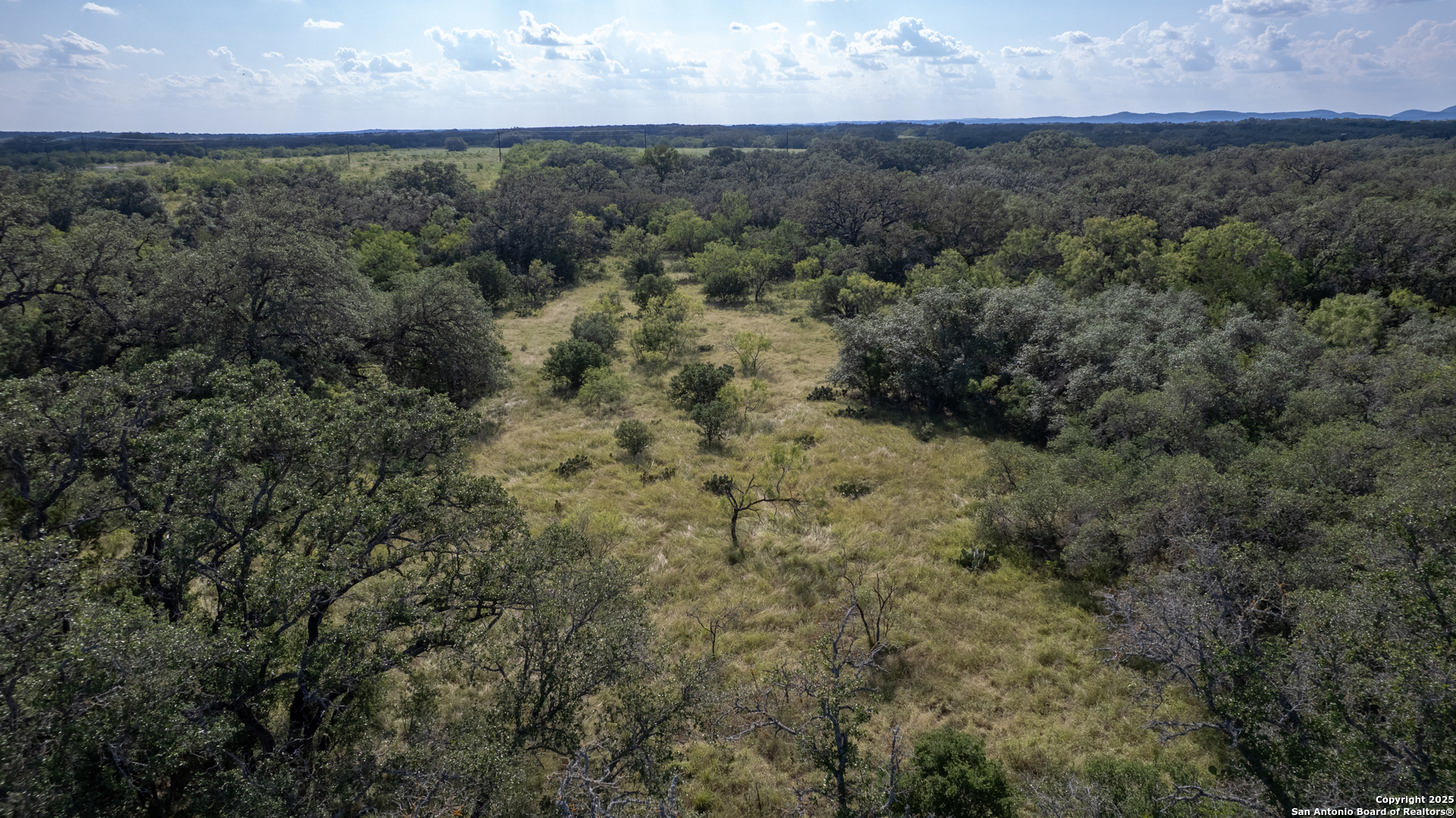 1 Utopia Forest D'Hanis, TX 78850 - Photo 22 of 36 an aerial view of residential houses with outdoor space