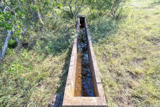 a close up of a wall with a sink