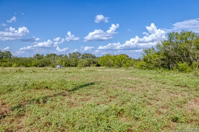 a view of outdoor space and a yard