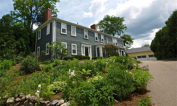 20 Farnham Circle Needham, MA 02492 - Photo 1 of 23 a front view of a house with a yard