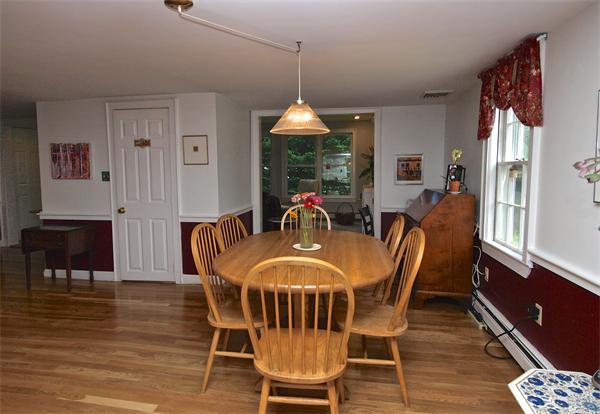 20 Farnham Circle Needham, MA 02492 - Photo 12 of 23 a view of a dining room with furniture window and wooden floor