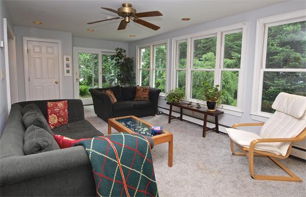 20 Farnham Circle Needham, MA 02492 - Photo 14 of 23 a living room with furniture and a large window