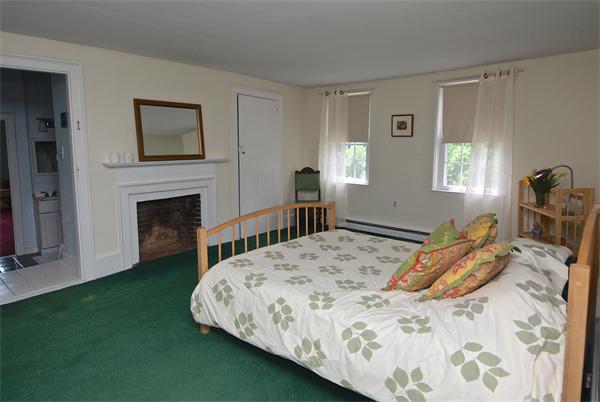 20 Farnham Circle Needham, MA 02492 - Photo 17 of 23 a bed sitting in a bedroom and table chair