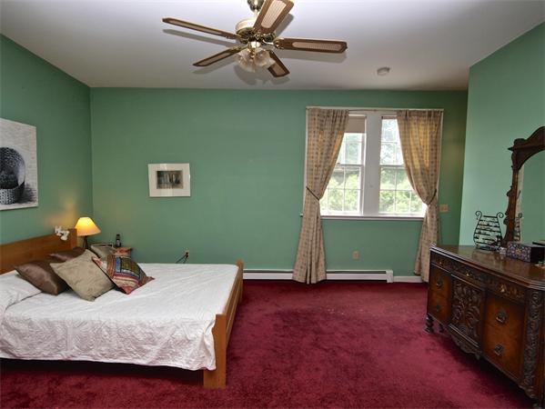 20 Farnham Circle Needham, MA 02492 - Photo 19 of 23 a bedroom with a bed and a window