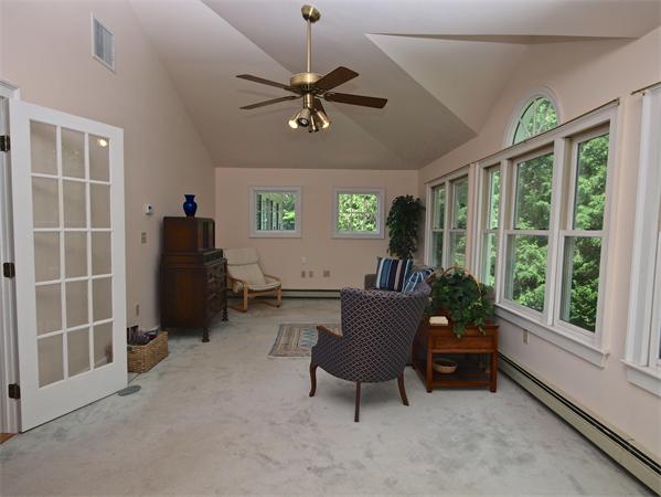 20 Farnham Circle Needham, MA 02492 - Photo 20 of 23 a view of a livingroom with furniture and a window