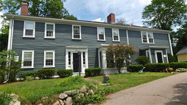 20 Farnham Circle Needham, MA 02492 - Photo 2 of 23 a front view of a house with a yard
