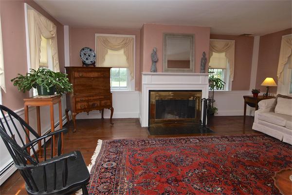 20 Farnham Circle Needham, MA 02492 - Photo 4 of 23 a living room with furniture and a fireplace