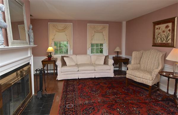 20 Farnham Circle Needham, MA 02492 - Photo 5 of 23 a living room with furniture and a fireplace