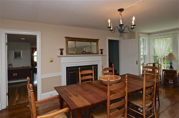 20 Farnham Circle Needham, MA 02492 - Photo 9 of 23 a dining room with furniture and chandelier