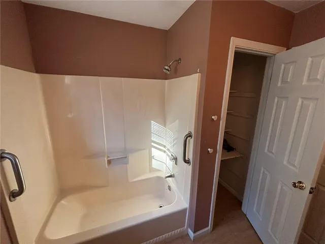 a bathroom with a bathtub