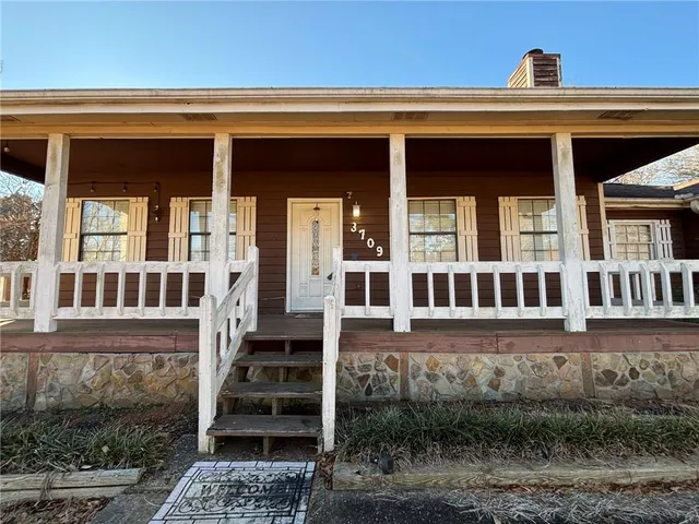 front view of a house with a small porch