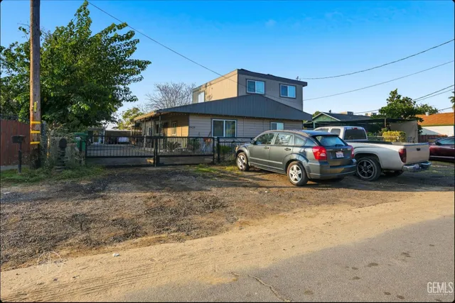 a car parked in front of a house