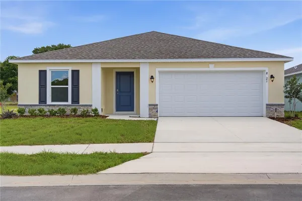 a front view of house with yard