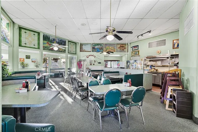 a group of people sitting in a living room
