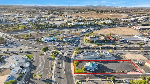 an aerial view of a city with streets