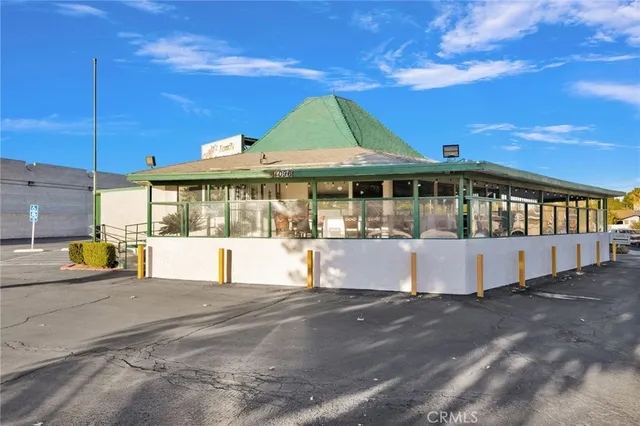a view of pool with large windows