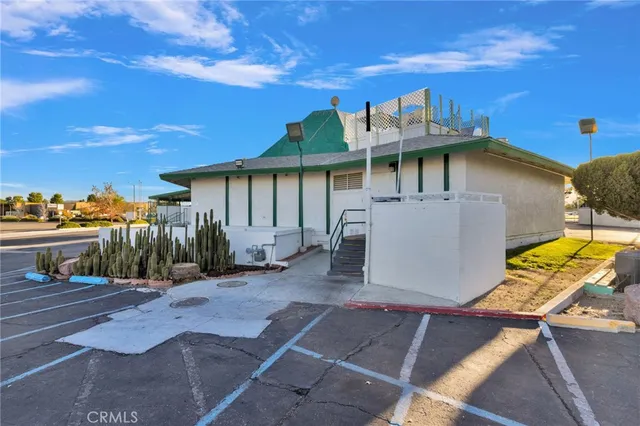 a view of a house with wooden walls