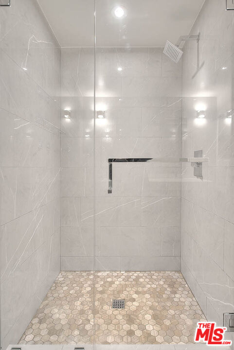 5014 Rosewood Avenue, Unit 1/2 Los Angeles, CA 90004 - Photo 24 of 45 a bathroom with a shower