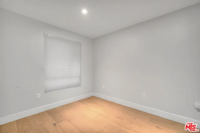 a view of a hallway with stairs