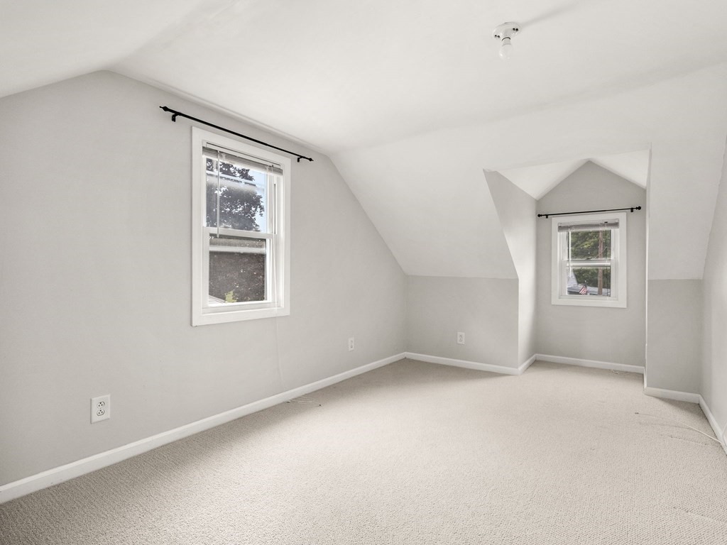 86 Anniversary Street Springfield, MA 01104 - Photo 19 of 31 an empty room with windows