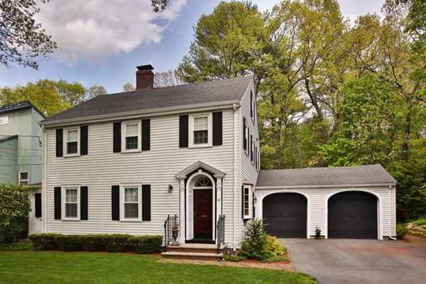 19 Downing Road Lexington, MA 02421 - Photo 1 of 10 a front view of a house with garden