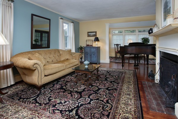 19 Downing Road Lexington, MA 02421 - Photo 3 of 10 a living room with furniture and a fireplace