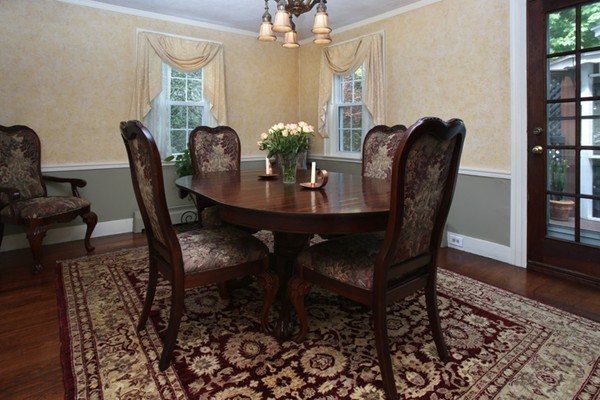19 Downing Road Lexington, MA 02421 - Photo 4 of 10 a view of a dining room with furniture and wooden floor