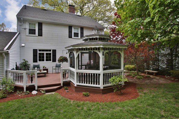 19 Downing Road Lexington, MA 02421 - Photo 5 of 10 a view of house with a yard and deck