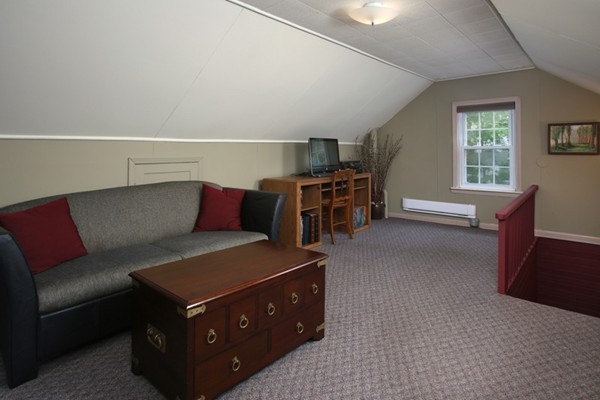 19 Downing Road Lexington, MA 02421 - Photo 7 of 10 a living room with furniture and windows