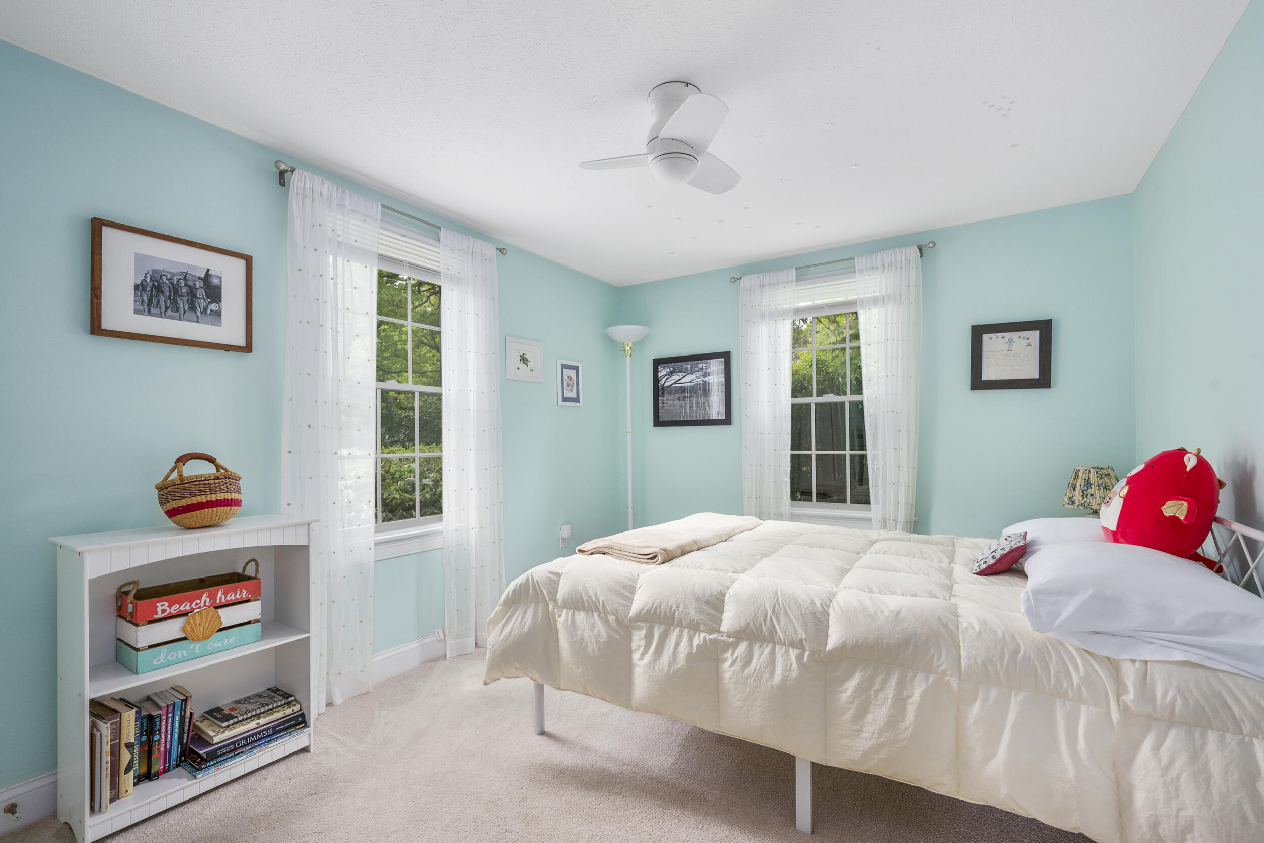 10 Neshobe Road Mashpee, MA 02649 - Photo 13 of 40 a bedroom with a bed and a window