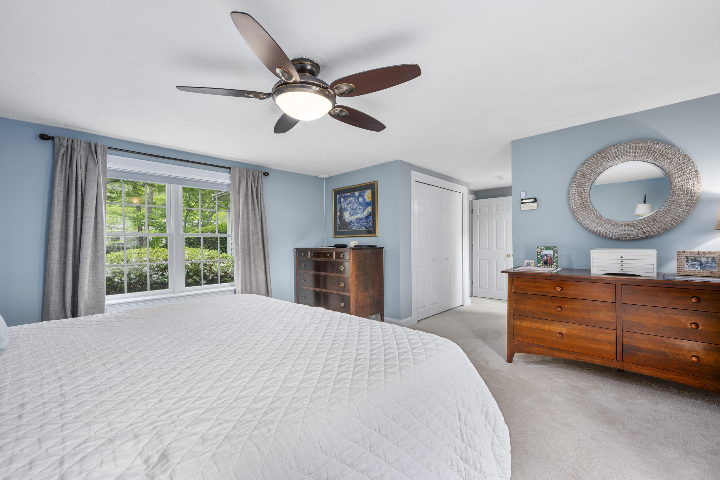 10 Neshobe Road Mashpee, MA 02649 - Photo 15 of 40 a bed room with a bed and a dresser